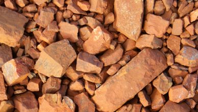 Loose stony iron ore prepared for the ISO 4688 flame atomic absorption spectrometric method to determine aluminum content.