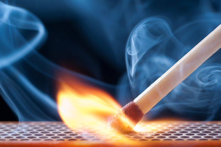 A match lighting on fire