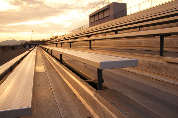 Bleachers basking in the sunset due to ICC 300-2017 compliance