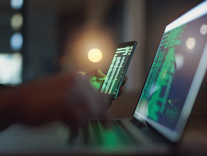 Someone coding on a computer that has been assigned to them through Role Based Access Control INCITS 359