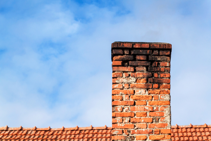 A house chimney that has seen some serious age and needs NFPA 211 2019