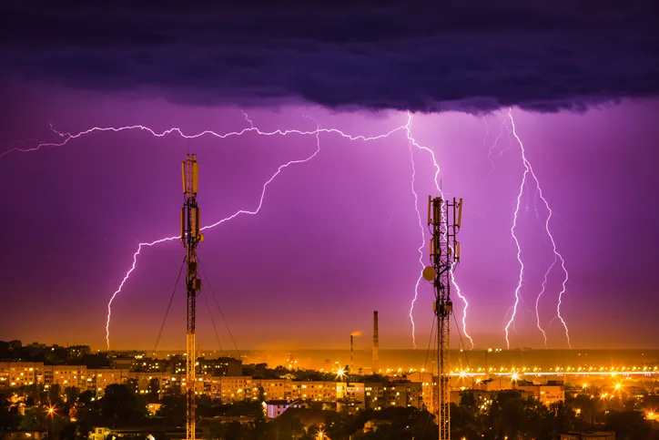 Lightning protection systems under purple sky installed with NFPA 780-2020
