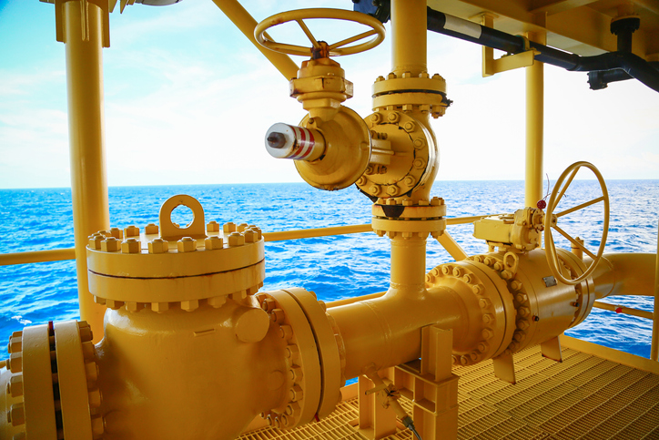 Yellow process piping that follows the ASME B31.3 2018 code offshore