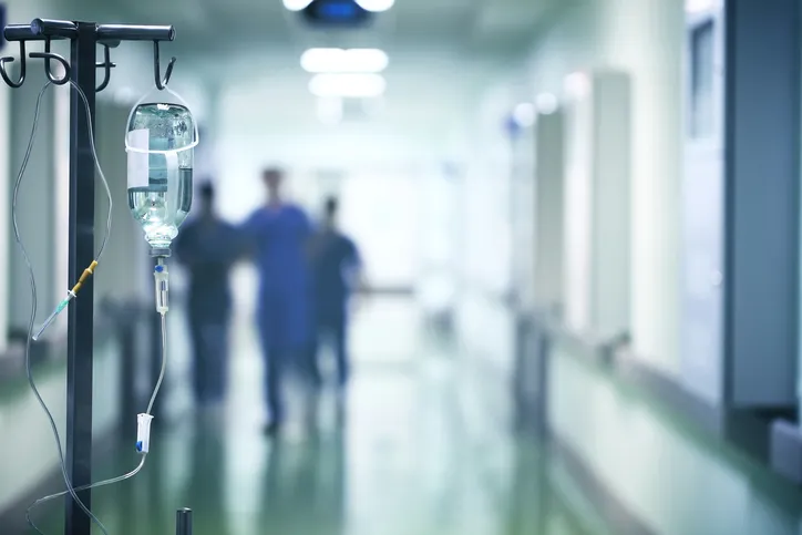 A group of surgeons walking down hallway