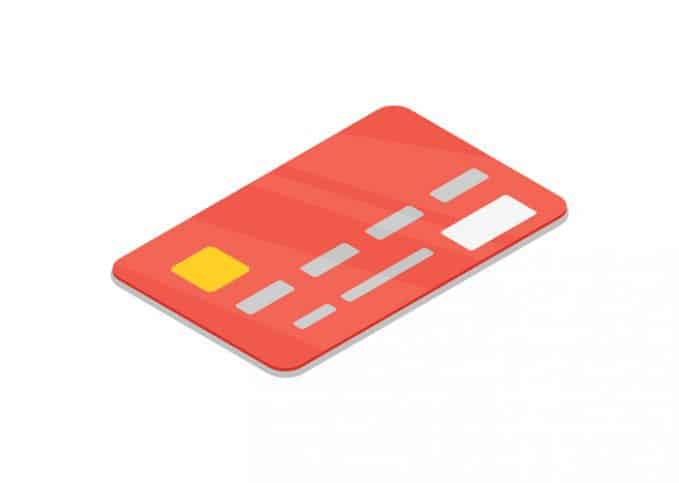 Red credit card on white background with numbers following ISO/IEC 7812-2017 for identification card issuers.