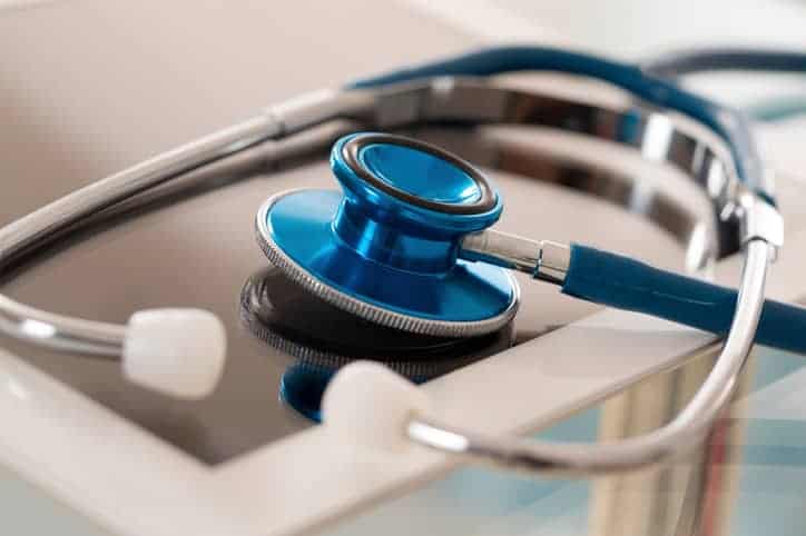 Stethoscope A blue stethoscope on tablet contract sterilized via AAMI TIR14:2016 with ethylene oxide.
