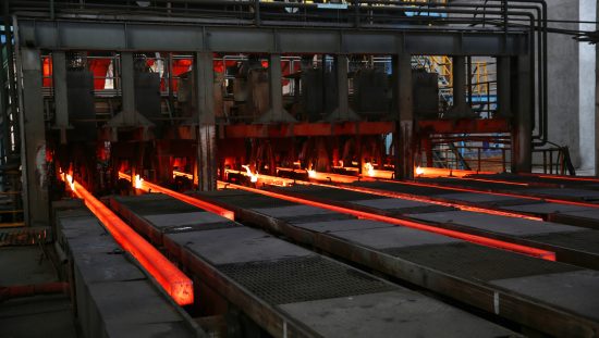 Red molten steel oozing and measured by AMS 2750F-2020 pyrometry specifications through ISO/IEC 17025 accreditation.