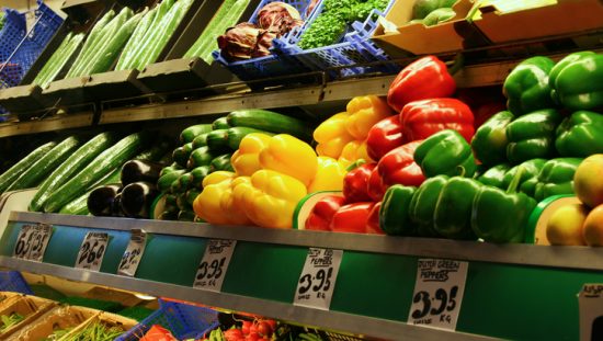 Vibrant colorful peppers in produce line with safety assured through FSSC 22000 food safety management accreditation.