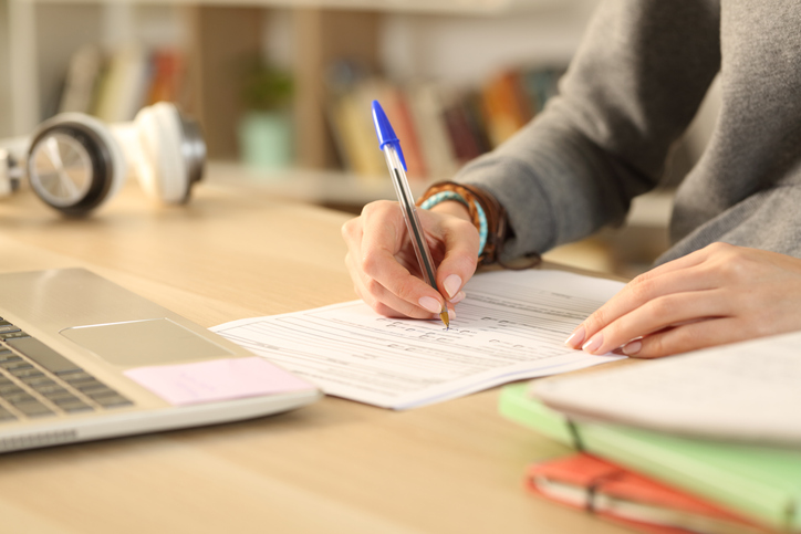 A certificate issuer filling out CAP-FR-304 application for ANAB accreditation to ASTM E2659-18 to help assessors.
