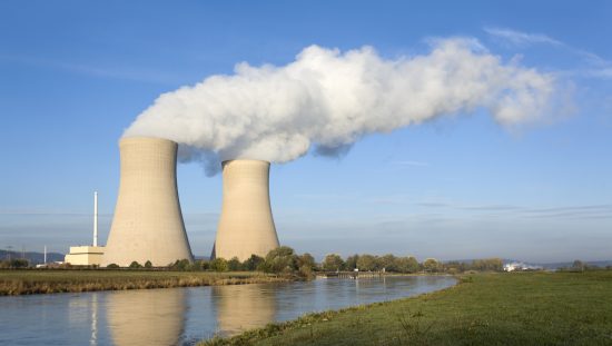 Research reactor surrounded by water with ANSI/ANS-15.4-2016 (R2021) trained personnel.
