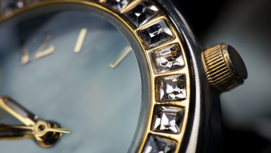 A gold rolex with IEC 60086-3:2021 watch batteries properly fitting inside under standard conditions.